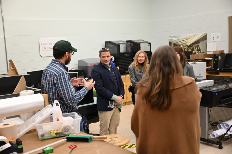 Image of Plastipak leaders on a tour of the MSU School of Packaging.